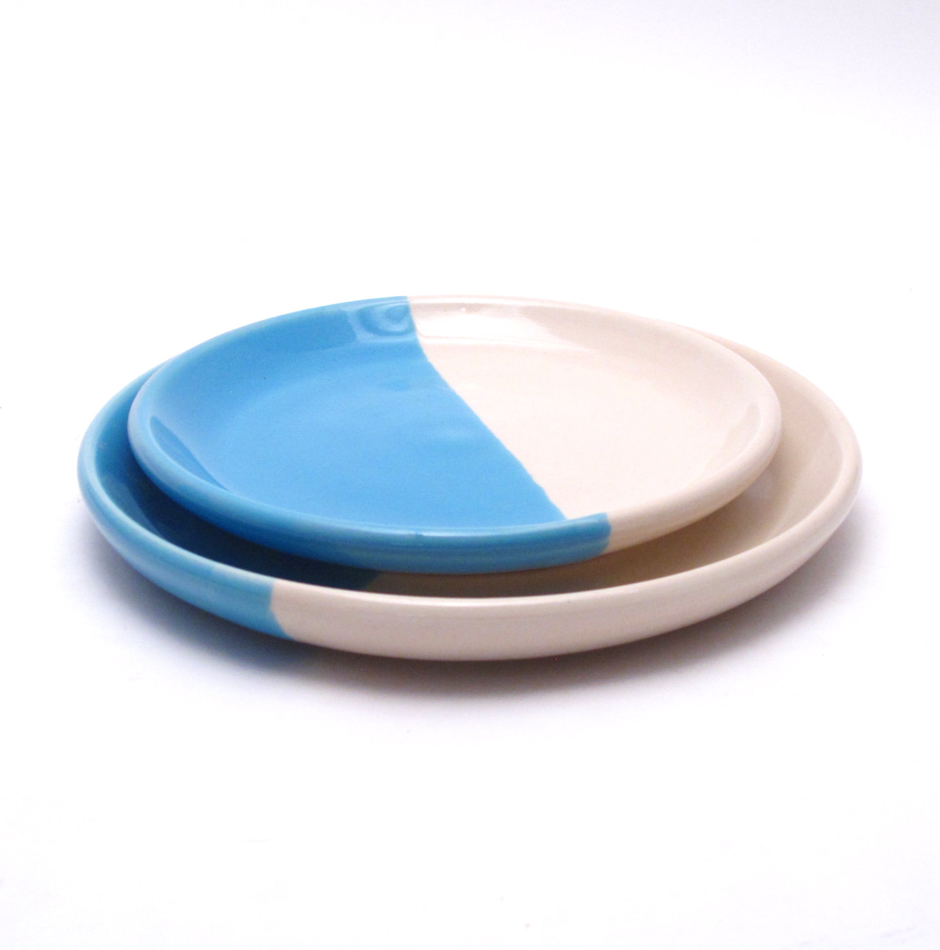 Pair of Aqua and White mismatched plates