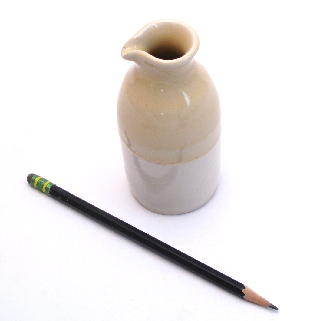 Yellow and White Creamer